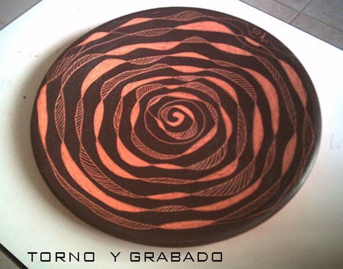 plato de torno grabado con espiral imagenes y arte